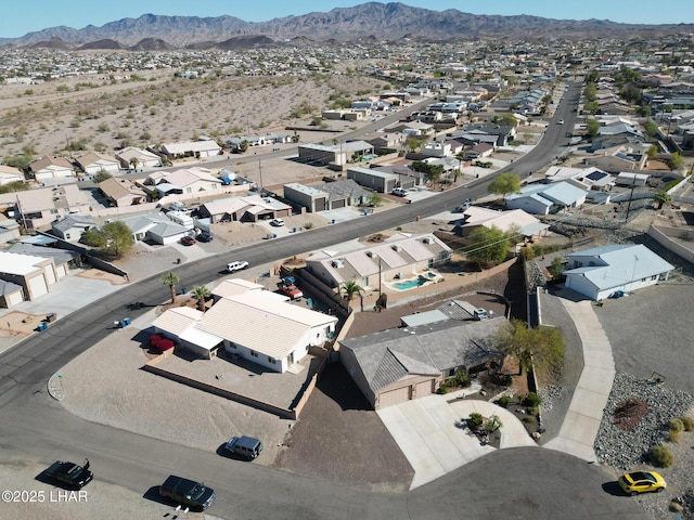 drone / aerial view featuring a mountain view and a residential view