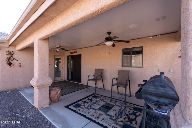 view of patio with a ceiling fan