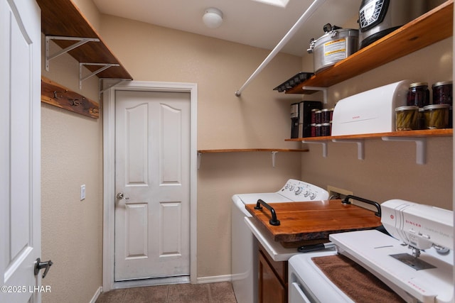 laundry room featuring tile patterned floors, baseboards, washing machine and dryer, and laundry area