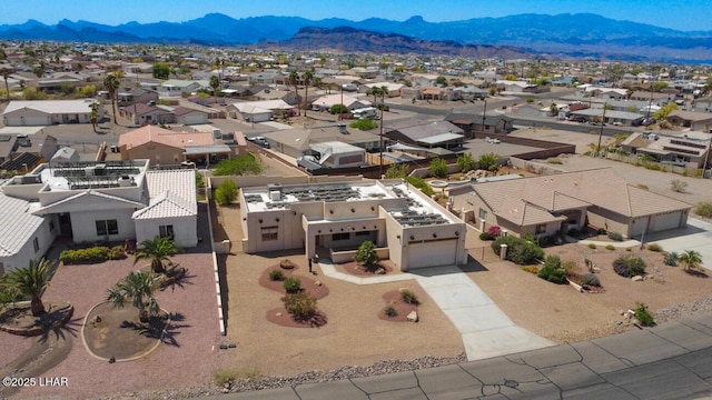 bird's eye view with a mountain view and a residential view