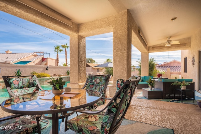 view of patio featuring an outdoor hangout area and ceiling fan