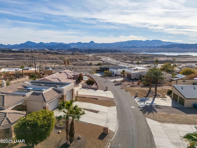 drone / aerial view featuring a mountain view