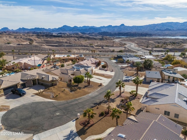 drone / aerial view featuring a mountain view