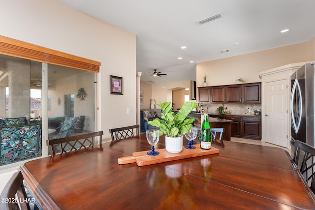 dining space with ceiling fan