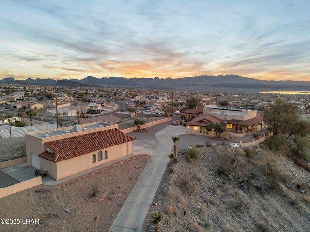 aerial view at dusk with a mountain view