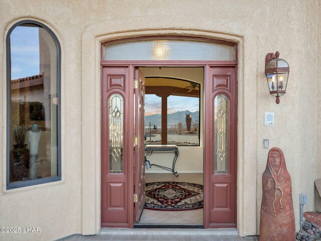 doorway to property with a mountain view