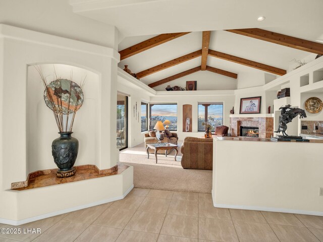 tiled living room with vaulted ceiling with beams