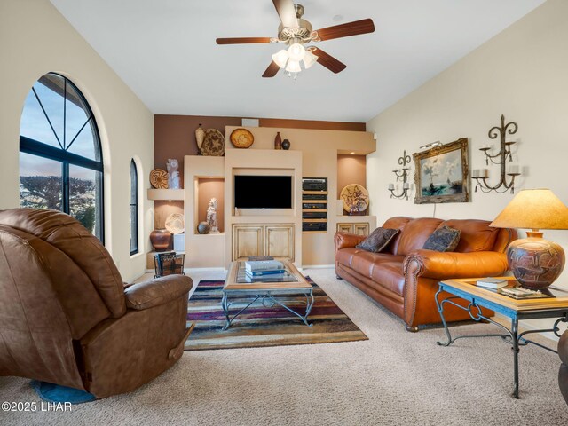 living room with carpet flooring and ceiling fan