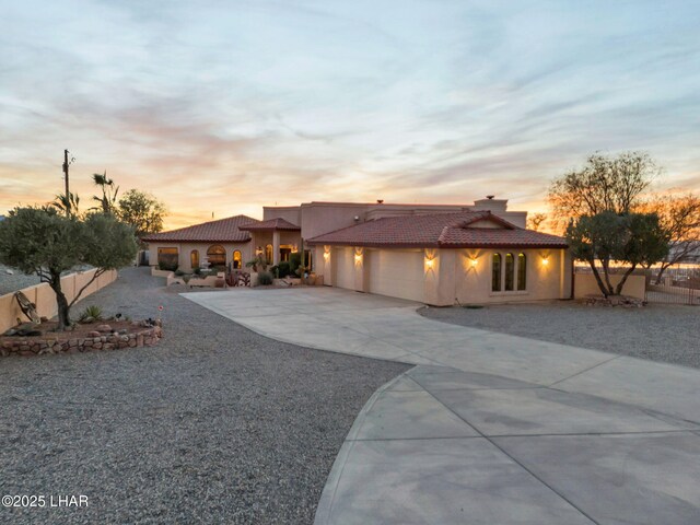 view of front of property featuring a garage