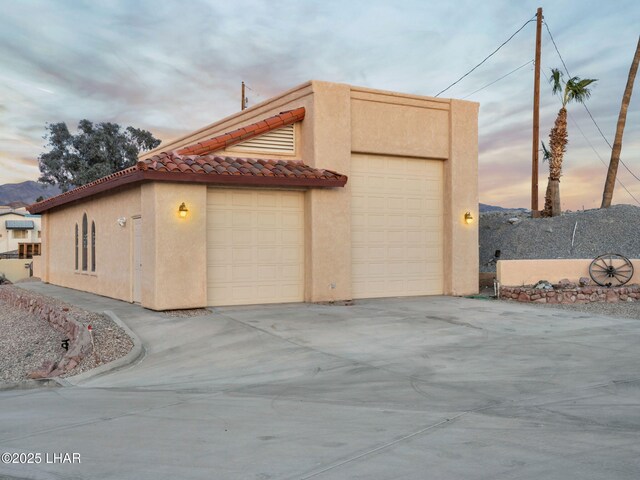 view of property exterior at dusk