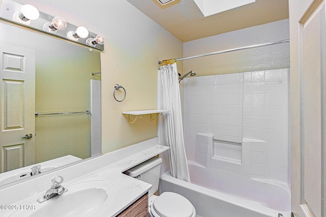 full bathroom with vanity, toilet, and shower / tub combo with curtain