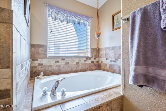 full bathroom featuring a garden tub