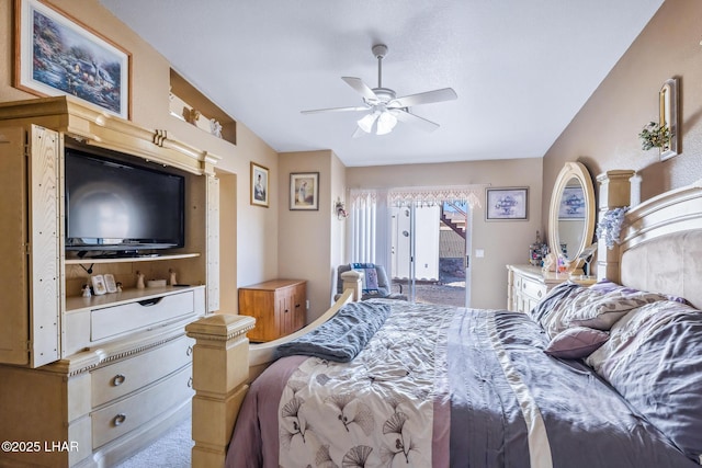 carpeted bedroom featuring access to outside and ceiling fan