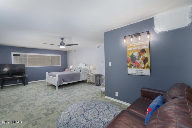 carpeted bedroom with baseboards, visible vents, and ceiling fan