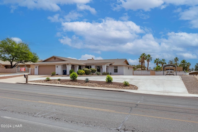 ranch-style home featuring a garage