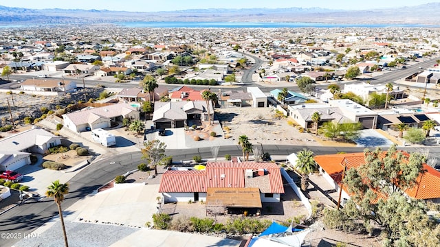 birds eye view of property featuring a mountain view