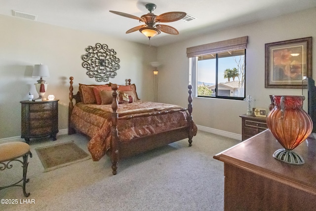 bedroom with ceiling fan and carpet