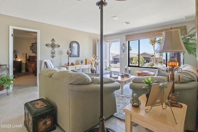 living room featuring light tile patterned flooring