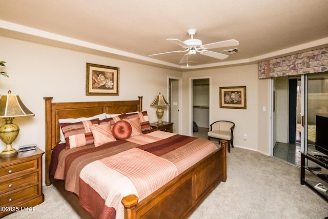 bedroom featuring light carpet and ceiling fan