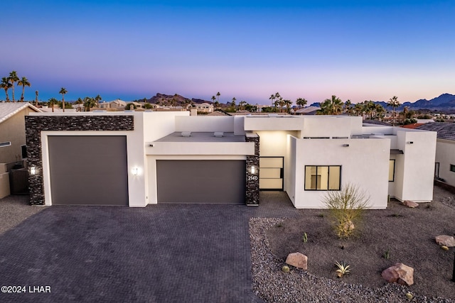 view of front of home with a garage