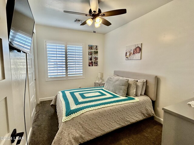 carpeted bedroom featuring ceiling fan