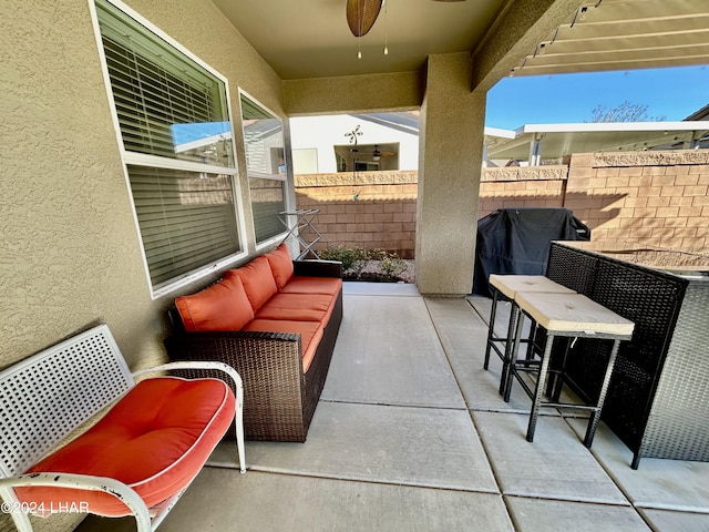 view of patio / terrace with area for grilling, an outdoor hangout area, and ceiling fan