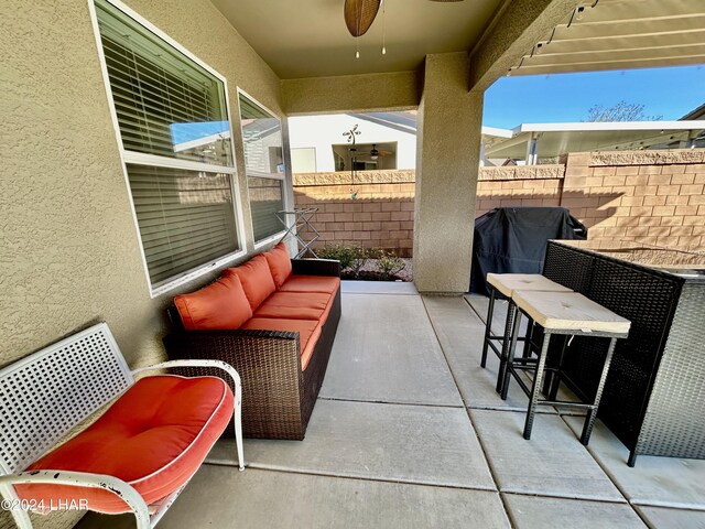 view of patio / terrace with area for grilling, an outdoor hangout area, and ceiling fan