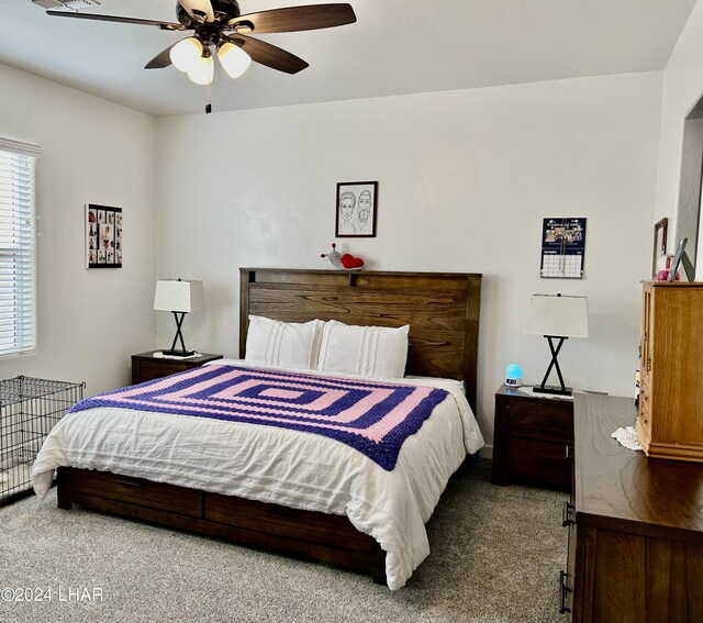 bedroom featuring ceiling fan and carpet flooring