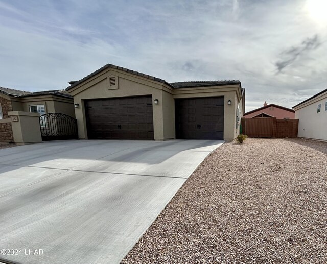 view of front of property with a garage