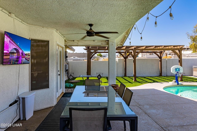 672 Wayside Dr, Lake Havasu City, AZ 86403 - view of patio / terrace with a pergola, a ceiling fan, a fenced backyard, and outdoor dining area