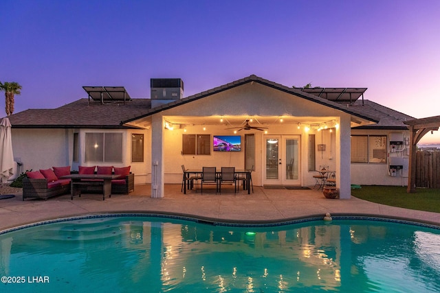672 Wayside Dr, Lake Havasu City, AZ 86403 - back of house with french doors, an outdoor hangout area, a patio area, and stucco siding