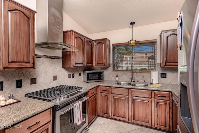 672 Wayside Dr, Lake Havasu City, AZ 86403 - kitchen featuring appliances with stainless steel finishes, a sink, wall chimney exhaust hood, vaulted ceiling, and backsplash