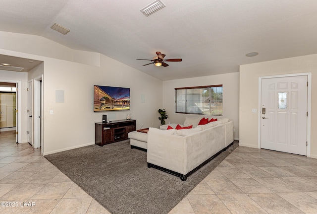 672 Wayside Dr, Lake Havasu City, AZ 86403 - living area featuring lofted ceiling, light tile patterned floors, a ceiling fan, and baseboards