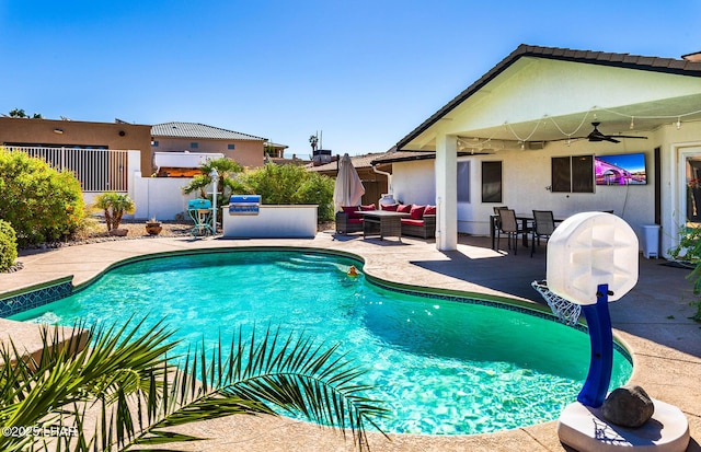 672 Wayside Dr, Lake Havasu City, AZ 86403 - swimming pool with a patio area, fence, ceiling fan, and an outdoor hangout area