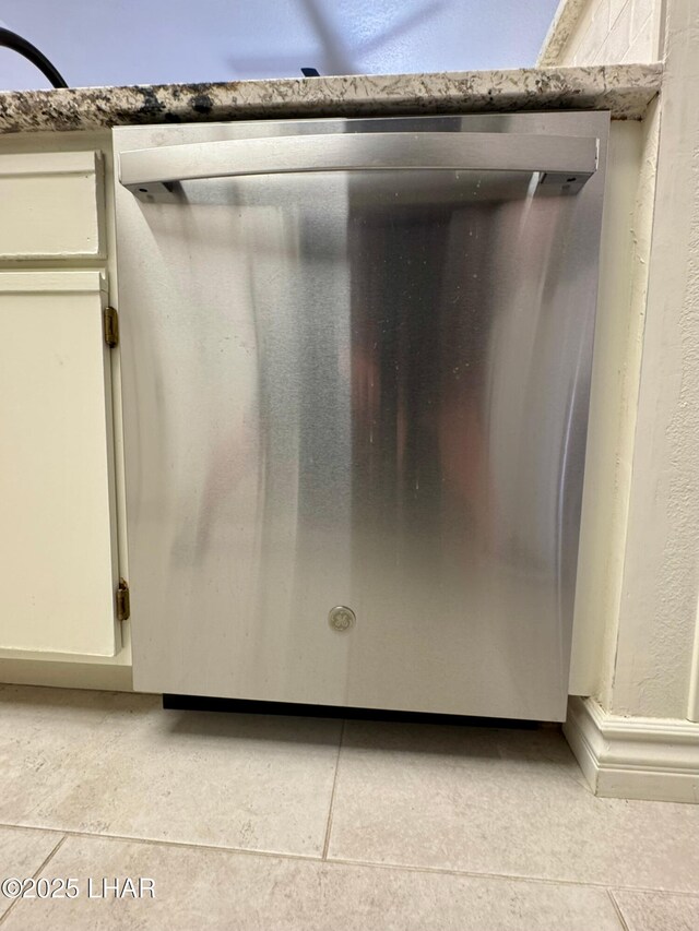 1650 S Smoketree Ave Unit 116, Lake Havasu City, AZ 86403 - kitchen view of dishwasher and white cabinetry