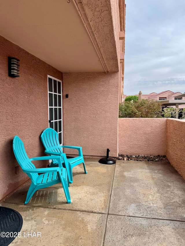 1650 S Smoketree Ave Unit 116, Lake Havasu City, AZ 86403 - view of patio / terrace with a balcony