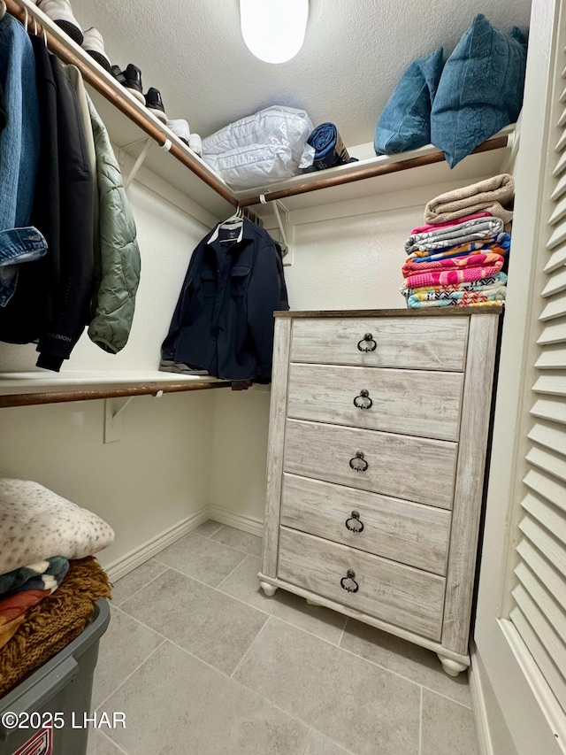 1650 S Smoketree Ave Unit 116, Lake Havasu City, AZ 86403 - spacious closet with light tile patterned flooring