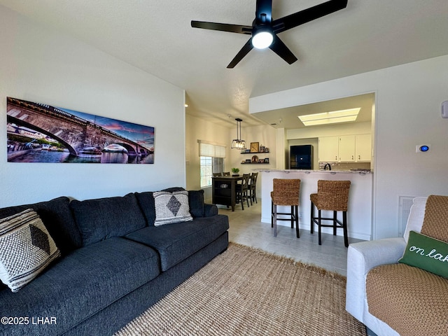 1650 S Smoketree Ave Unit 116, Lake Havasu City, AZ 86403 - living room featuring ceiling fan and light tile patterned floors