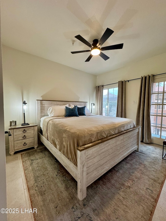 1650 S Smoketree Ave Unit 116, Lake Havasu City, AZ 86403 - bedroom with multiple windows and a ceiling fan
