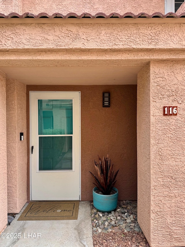 1650 S Smoketree Ave Unit 116, Lake Havasu City, AZ 86403 - doorway to property with stucco siding
