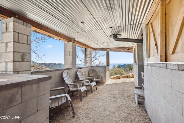 view of patio / terrace featuring a mountain view