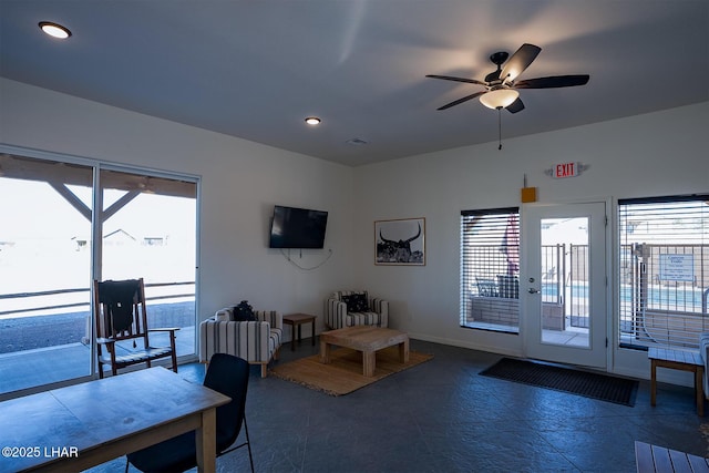 interior space featuring ceiling fan