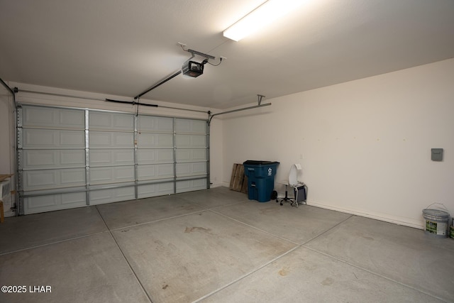 garage featuring a garage door opener