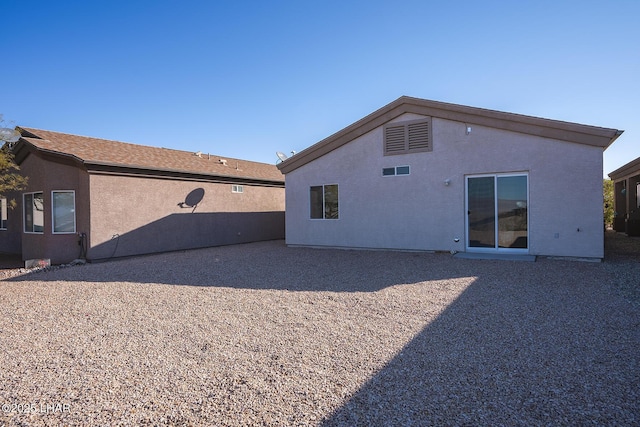 back of property featuring a patio