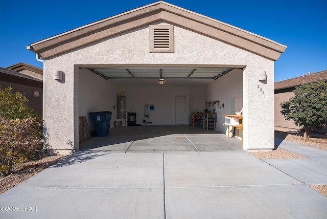 garage with electric water heater