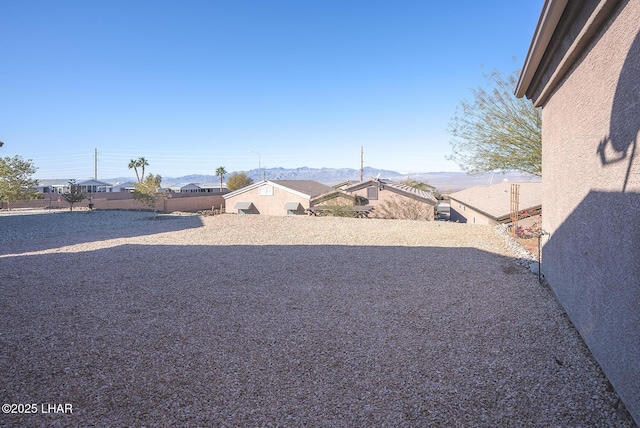 view of yard with a mountain view