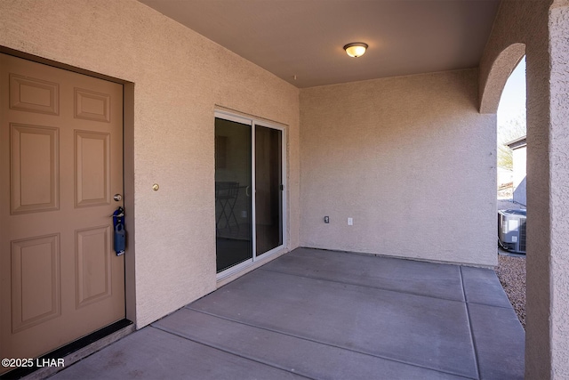 view of patio with central AC