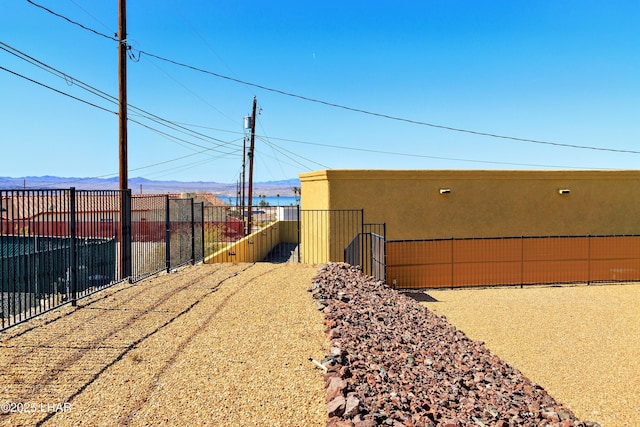 2930 Poseidon Ln, Lake Havasu City, AZ 86404 - view of yard featuring a mountain view and fence
