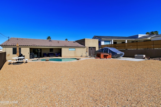 2930 Poseidon Ln, Lake Havasu City, AZ 86404 - rear view of house with a patio area, stucco siding, and fence