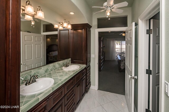 bathroom featuring vanity and ceiling fan